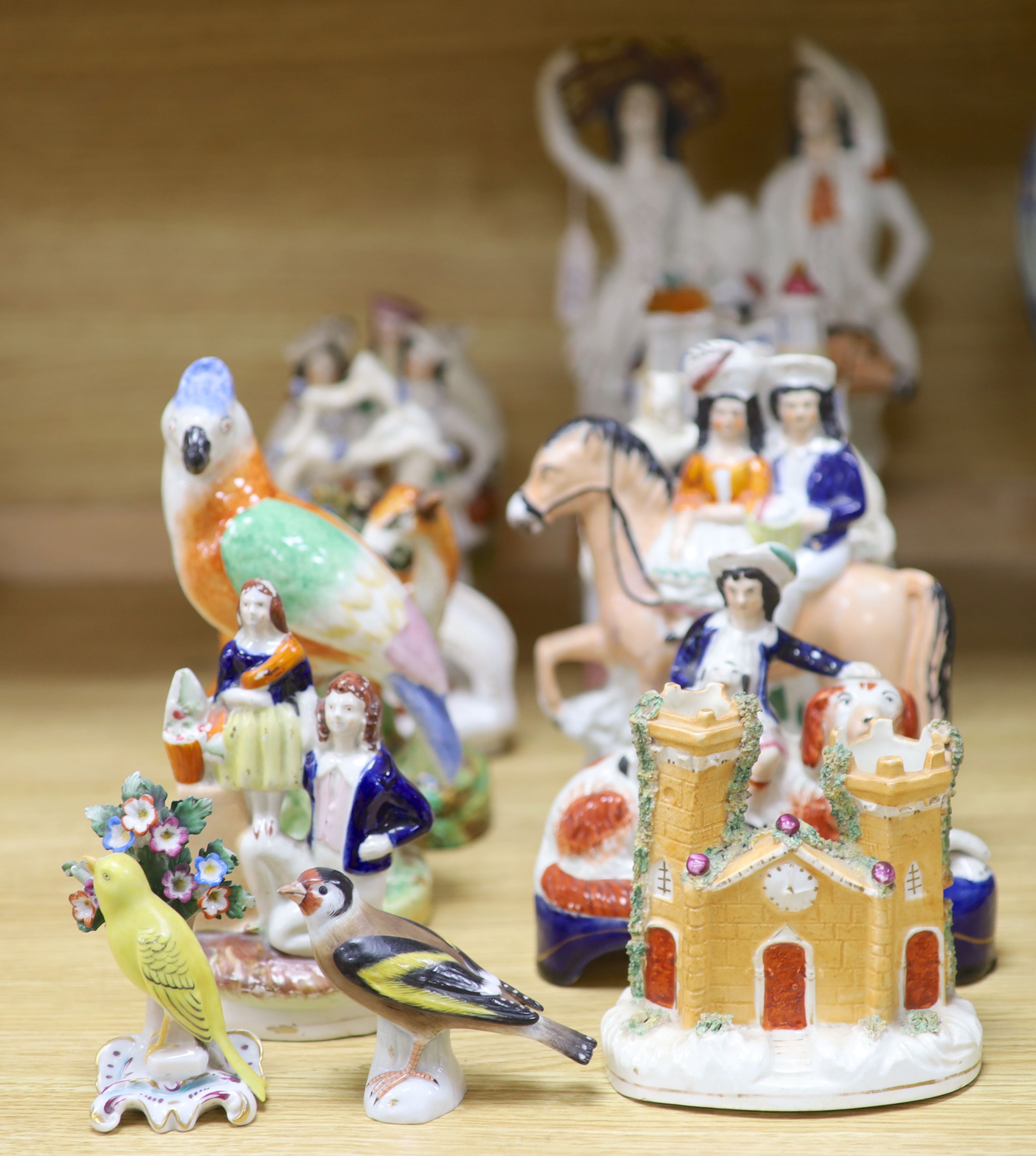 A collection of assorted Staffordshire figures and sundry ceramics including mid 18th century Staffordshire deer, tallest 33cm